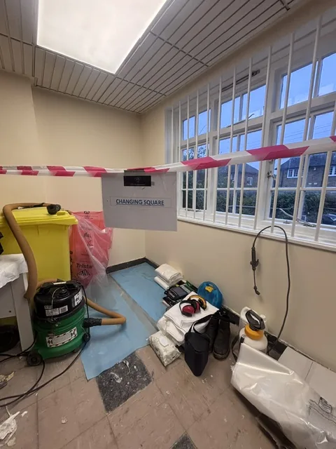 Asbestos floor tile and bitumen removal in Leyton